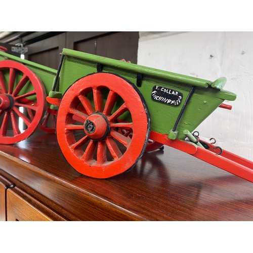 72 - Two bespoke made wooden model carts painted in red and green