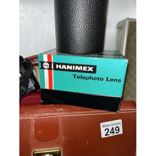 249 - Minolta 7000 camera with 35-70mm f4 lens, a Minolta AF Zoom 70-210mm F4 lens together with a Hanimex... 