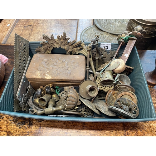 73 - A quantity of vintage and antique furniture pieces including door plates, ceramic and brass wheels, ... 