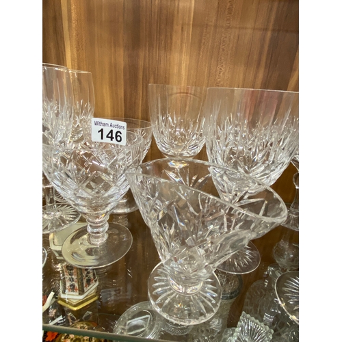 146 - A quantity of cut crystal glassware, to include all different types of glasses, wine glasses, brandy... 