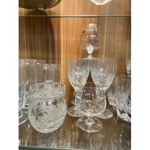 146 - A quantity of cut crystal glassware, to include all different types of glasses, wine glasses, brandy... 