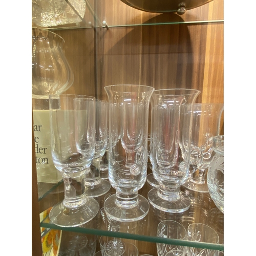 146 - A quantity of cut crystal glassware, to include all different types of glasses, wine glasses, brandy... 