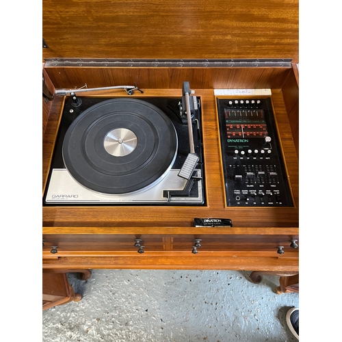 119 - Dynatron Stereophonic tuner/amplifier 1275A series, with Garrard SP 25 MK iv record deck on table wi... 