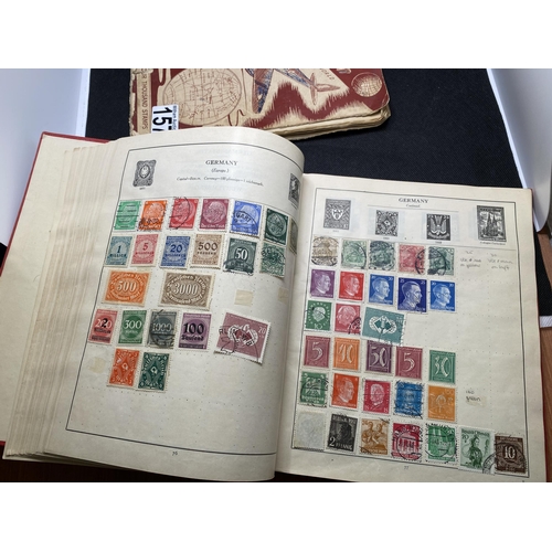 157 - The Globe stamp album, containing stamps from around the world together with a Strand stamp album to... 