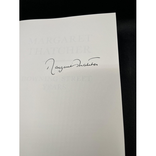 27 - A signed copy of Margaret Thatcher The Downing Street Years, signed by Maggie Thatcher in good condi... 