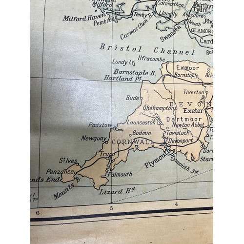 35 - A vintage map of Great Britain and Ireland (mounted on wooden pole to roll), in good condition