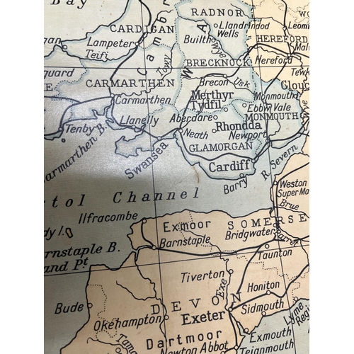 35 - A vintage map of Great Britain and Ireland (mounted on wooden pole to roll), in good condition