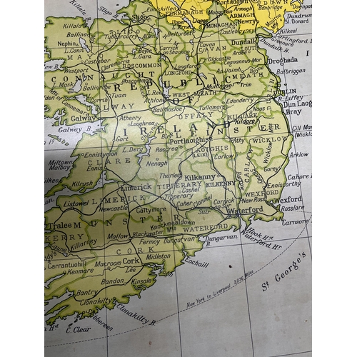 35 - A vintage map of Great Britain and Ireland (mounted on wooden pole to roll), in good condition