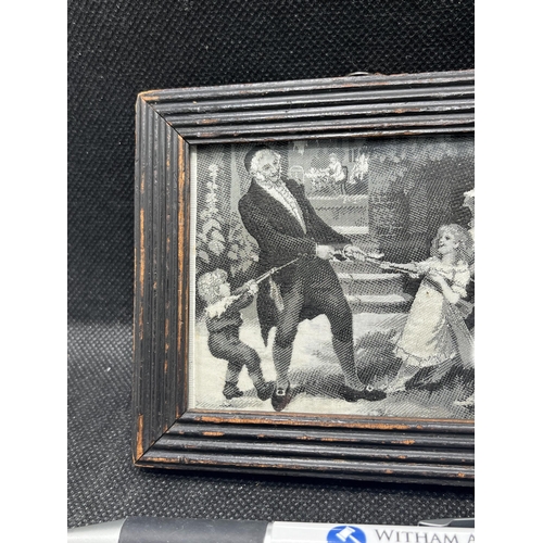 56 - A Stevengraph silk picture depicting children playing tug of war with a father figure and dog, appro... 