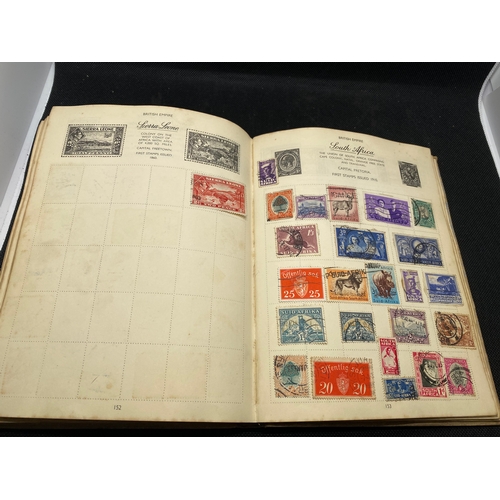 155 - A hardback - The Nelson stamp album, in excess of 135 pages full/part filled with stamps from variou... 