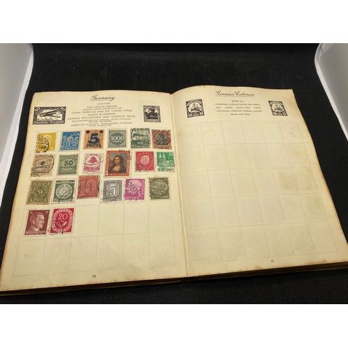 155 - A hardback - The Nelson stamp album, in excess of 135 pages full/part filled with stamps from variou... 