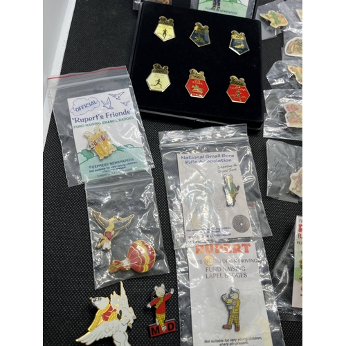 37 - A selection of different pin badges from Roald Dahl and some Rupert bear pin badges