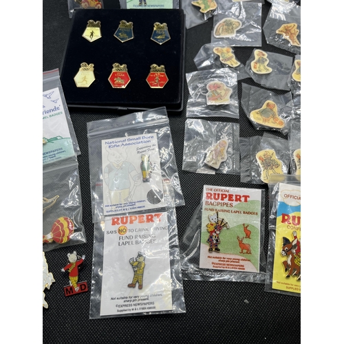 37 - A selection of different pin badges from Roald Dahl and some Rupert bear pin badges