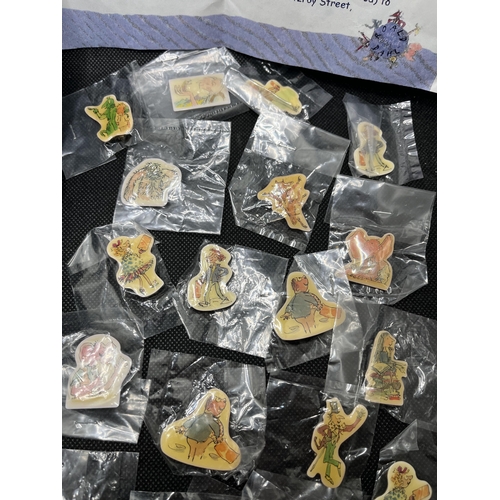 37 - A selection of different pin badges from Roald Dahl and some Rupert bear pin badges