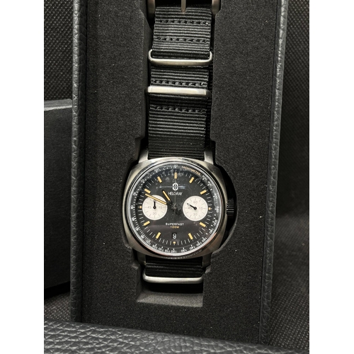 21 - A Helgray watch 'Superfast' in midnight black with two subsidiary dials, as new with protective film... 