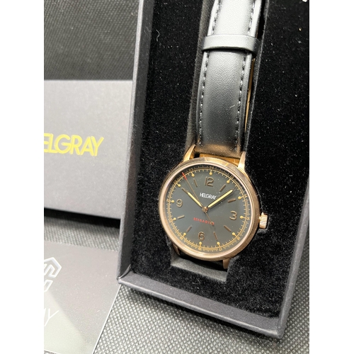 26 - A Helgray watch 'Brigadier' automatic wristwatch with black face and rose gold-coloured hands, case ... 