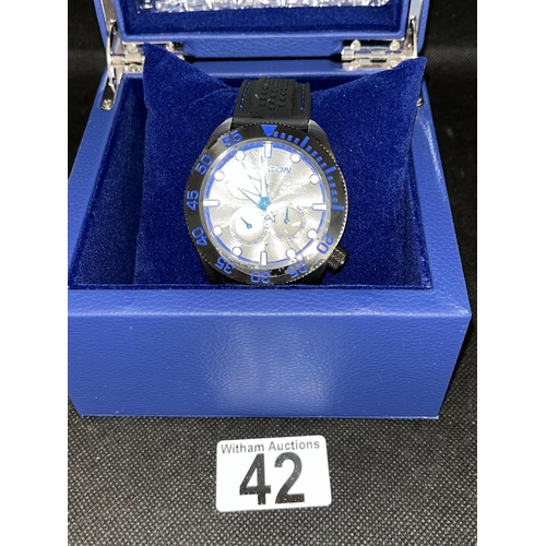 42 - Aragon wristwatch with black/blue design, as new, with box and leaflet