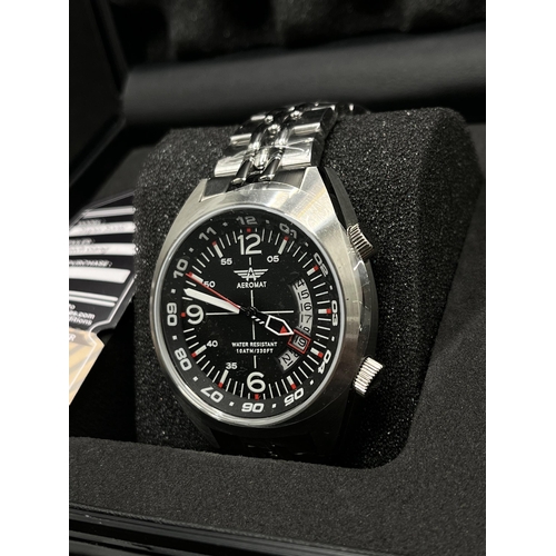 48 - Aeromat 'Super Sonic' wristwatch in stainless steel a date window and red detailing, 43m case, , as ... 