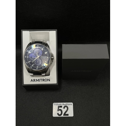 52 - An Armitron men's silver and navy-blue wristwatch, as new with box, with proof of purchase