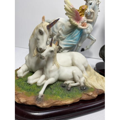 125 - Fairy and Unicorn figurine with box approx. H28cm, together with two other resin figures