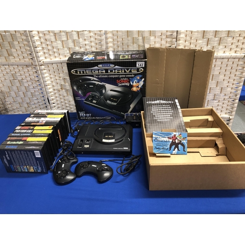 142 - Sega Mega Drive 16 bit arcade graphics plus digital stereo sound console in original box, with 12 ga... 