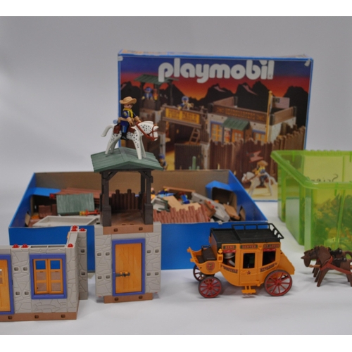 173 - A large selection of Playmobil which includes Roman colosseum, Indians New camp Thunder, Low Loader,... 