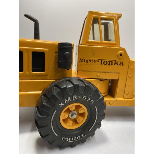 190 - Mighty Tonka 54726 orange road grader with snow plough, c.1970, purchased in the Middle East, approx... 