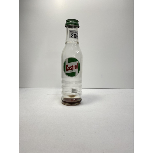 206 - A Castrol Motor Oil glass bottle with label in good condition.