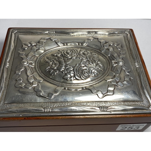 253 - A wooden jewellery box with silver reposse edwardian style design to lid, stamped 925 hallmarked She... 