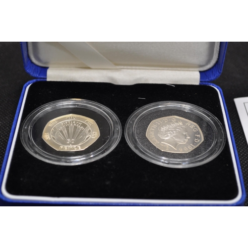 262 - Royal Mint silver proof piedfort fifty pence coin commemorating 150 years of public libraries with c... 