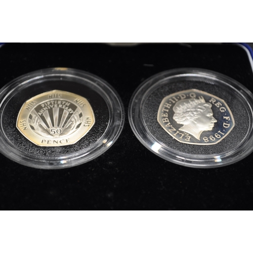 262 - Royal Mint silver proof piedfort fifty pence coin commemorating 150 years of public libraries with c... 