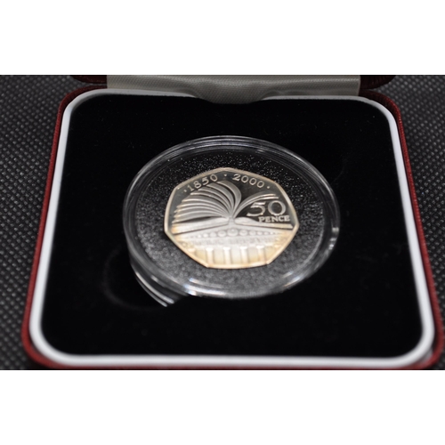 262 - Royal Mint silver proof piedfort fifty pence coin commemorating 150 years of public libraries with c... 