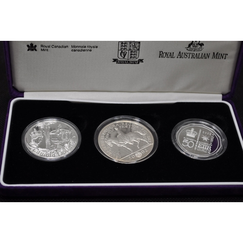 263 - Royal Mint Mint - The Accession Set, Australia, Canada and UK silver coin set with box, x 2 sets