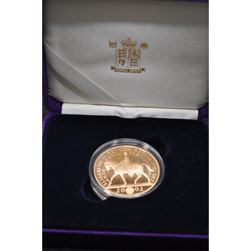 266 - Royal Mint Her Majesty The Queen Golden Jubilee 2002 22ct gold £5 Crown Coin, Certificate no.2395, l... 