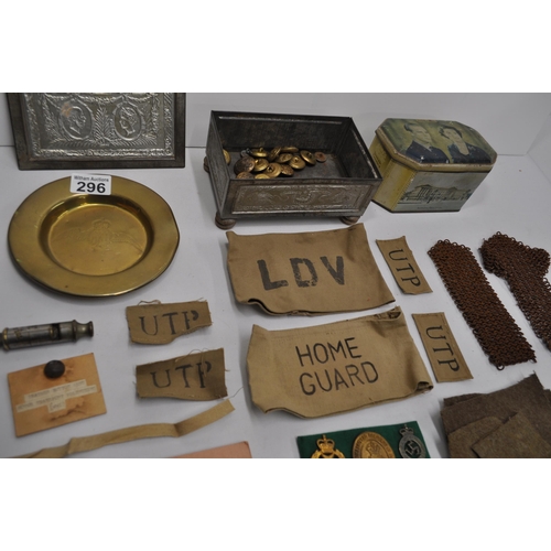 296 - Mixture of military items to incude RFC brass circular tray, badges, buttons, cloth badges, Metropol... 