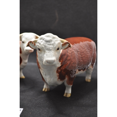 131 - Beswick Champion of champions bull, cow and calf (3)