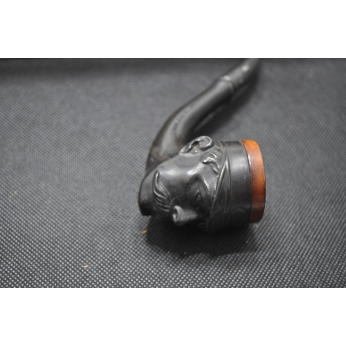 237 - A vintage pipe believed to depict Marshall Joffre, marked Depose to stem