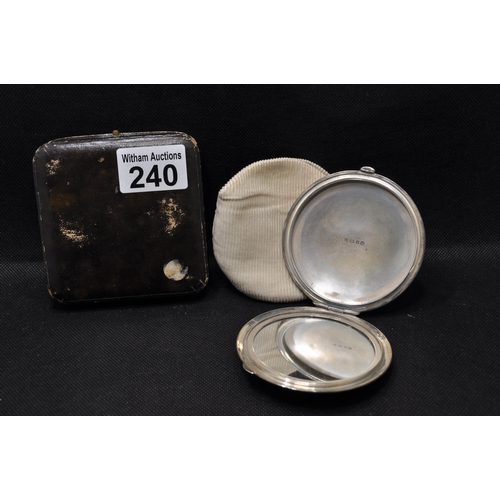 240 - A silver mirrored compact, hallmarked Birmingham 1944-5 with maker stamp Charles Green & Co. in a le... 