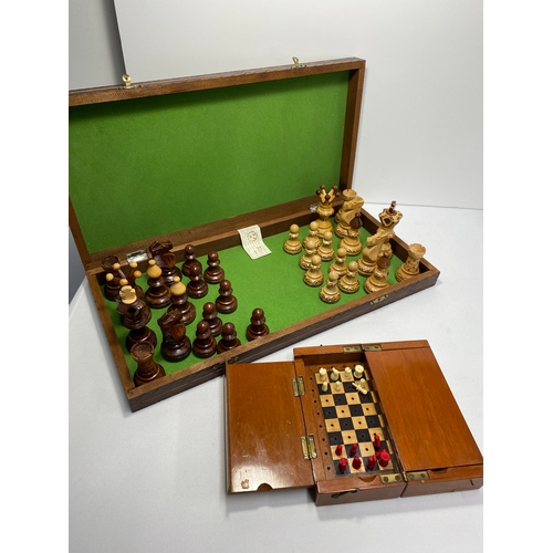 143 - Two chess sets, one hand carved senator chess set and one mini wooden travelling chess set in foldin... 