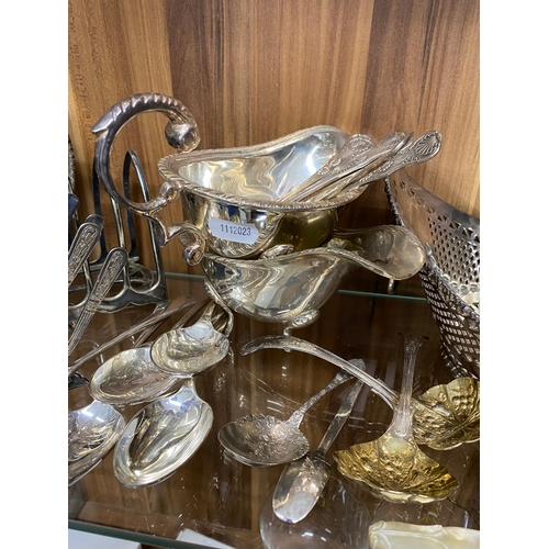 247 - Silver Plateware items consisting pierced bowls, toast racks, gravy boats and spoons,  to include tw... 