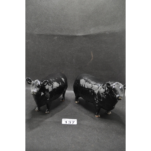 137 - Two Beswick cattle comprising Aberdeen Angus Bull and Aberdeen Angus Cow, both in black gloss with g... 