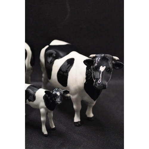 134 - Beswick Friesian Cow Family comprising CH. Coddington Hilt Bar bull, CH. Claybury Leegwater cow and ... 