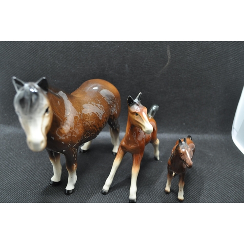 138 - Ceramic horses, one marked Holland to underside (3)