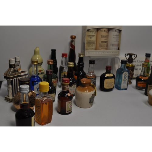 51 - A collection of miniature alcohols to include whisky, gin, tequila, mead and liqueur's featuring, Bo... 