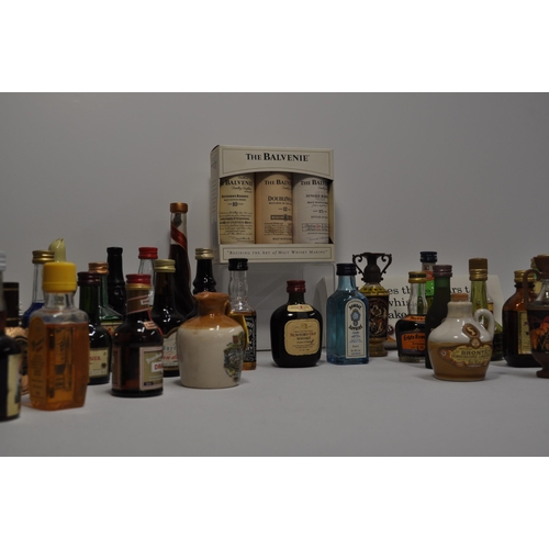 51 - A collection of miniature alcohols to include whisky, gin, tequila, mead and liqueur's featuring, Bo... 