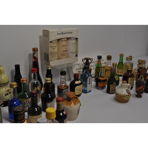 51 - A collection of miniature alcohols to include whisky, gin, tequila, mead and liqueur's featuring, Bo... 