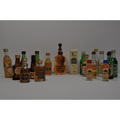 52 - A collection of miniature alcohols to include whisky, wine, port, and liqueur's featuring Glenmorang... 