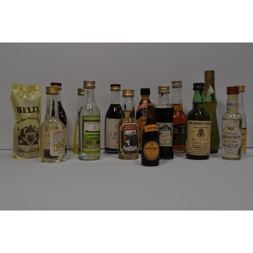 52 - A collection of miniature alcohols to include whisky, wine, port, and liqueur's featuring Glenmorang... 