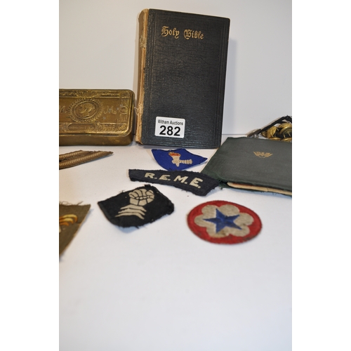 282 - WW1 Queen Mary  1914  Christmas Tin together with a large quantity of of military and other badges, ... 