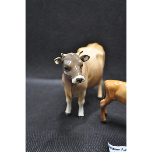 135 - Beswick Dunsley coy boy, cow and calf (3)